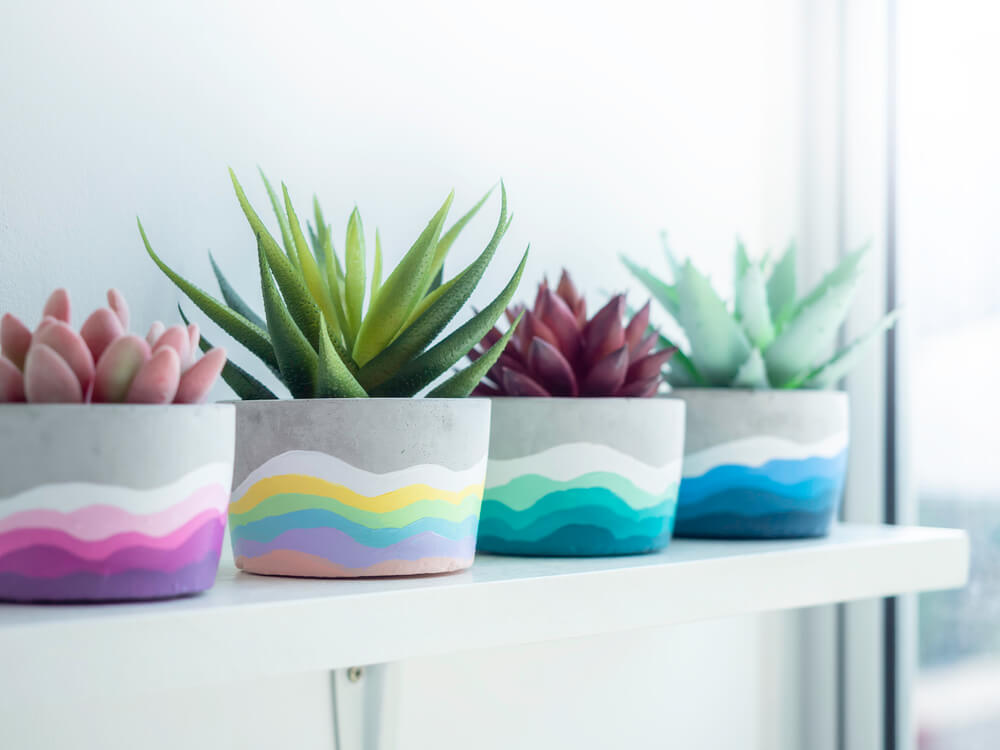 DIY concrete succulent planters painted with ombre patterns