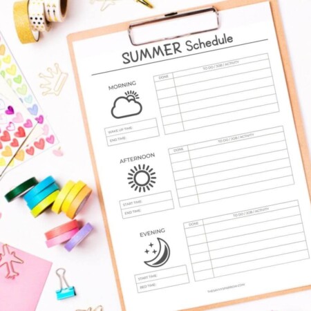 printable summer schedule template on a clipboard