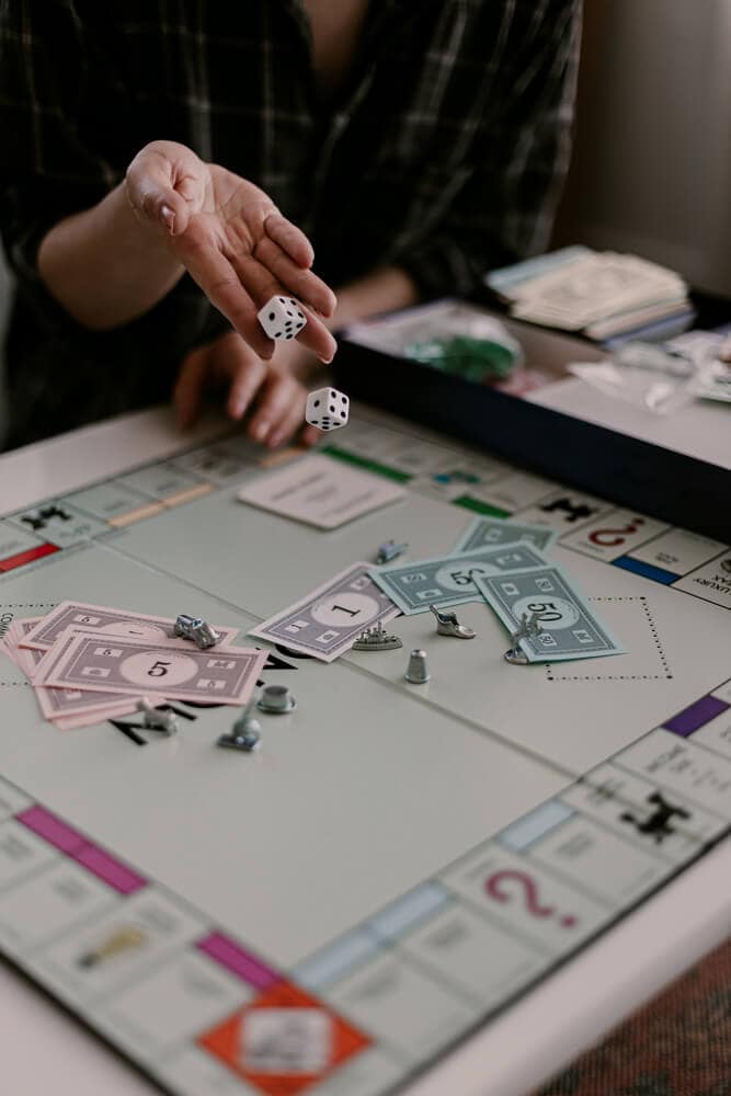 woman playing monopoly