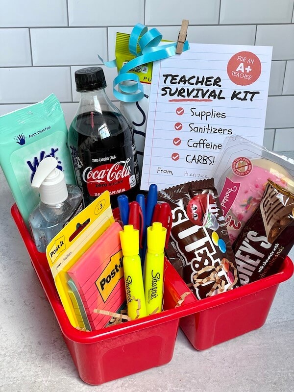 first day of school teacher gift with soda, candy, snacks, and school supplies