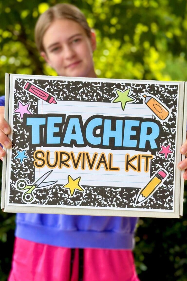 girl holding a teacher survival kit gift box