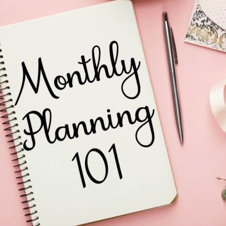 monthly planning 101 written in a notebook