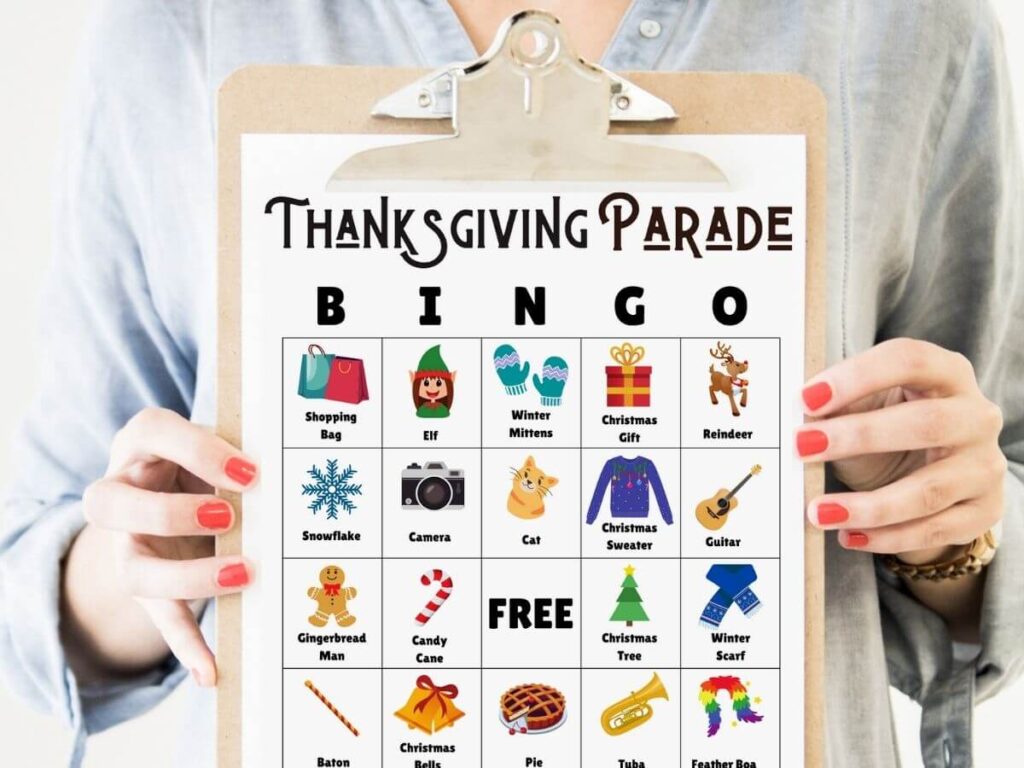 free printable Thanksgiving parade bingo card on a clipboard