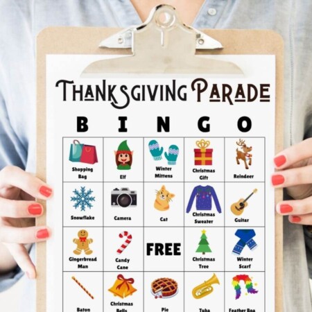 free printable Thanksgiving parade bingo card on a clipboard