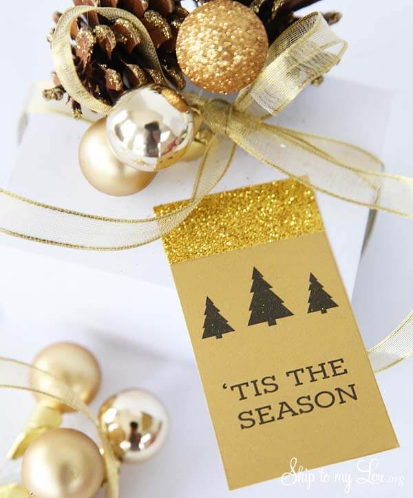 gold Christmas gift tag that says 'tis the season