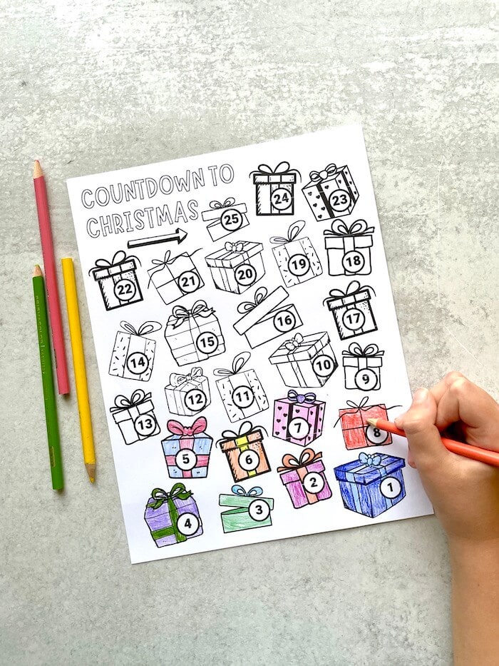 countdown to Christmas coloring page with gift boxes on it