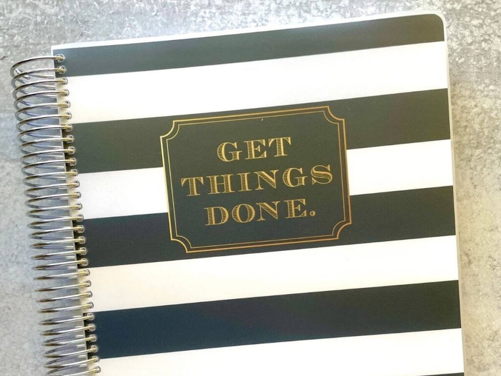 black and white customizable planner that says get things done