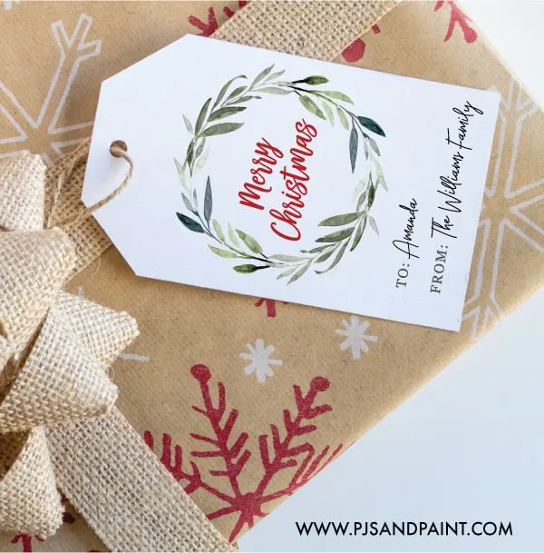 white Christmas gift tag with a wreath design