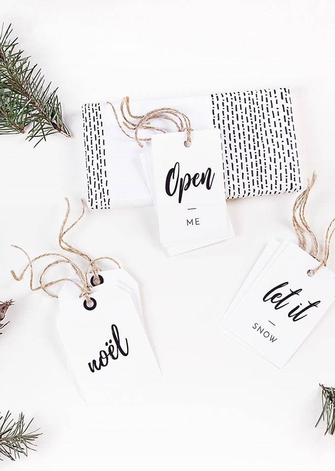 white Christmas gift tags with black lettering