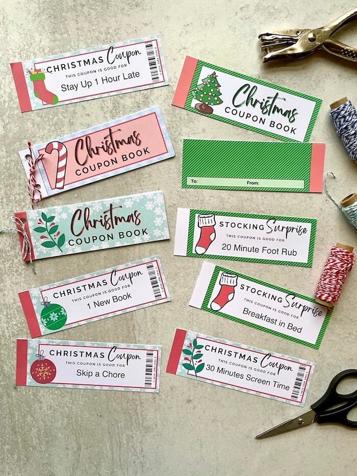 DIY Christmas coupon books being put together