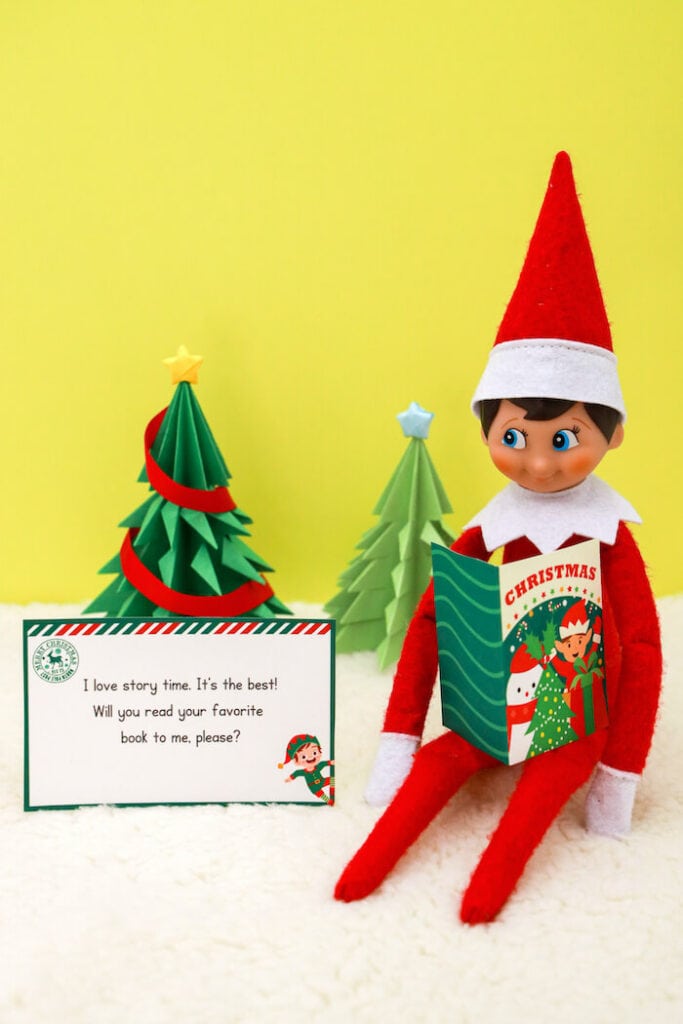 Elf on the shelf reading a mini book
