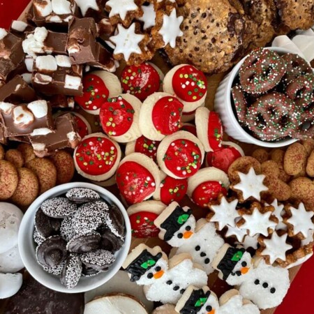 Christmas dessert charcuterie board with cookies and candies