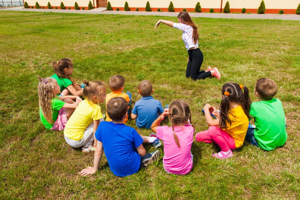 kids playing charades outside