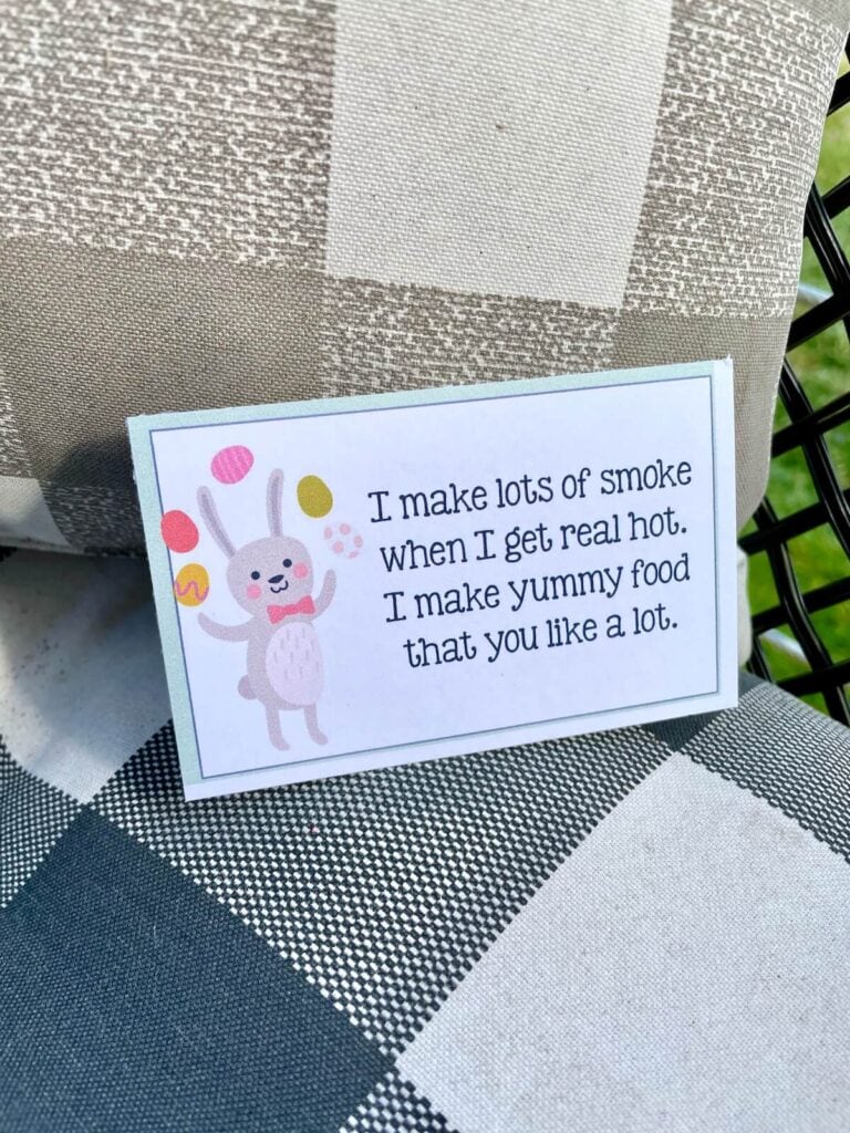 an Easter egg hunt clue on an outdoor chair