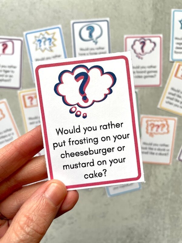 100 Would You Rather Questions for Couples (& Printable Cards!)