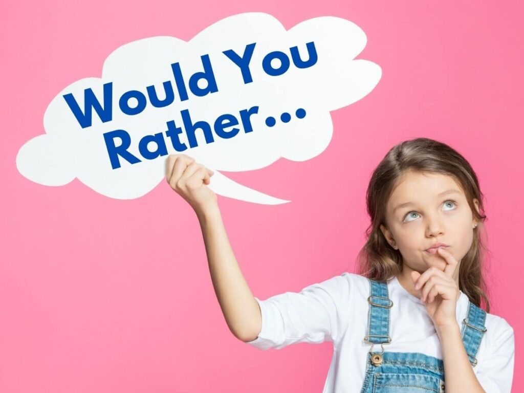 girl holding sign that says would you rather