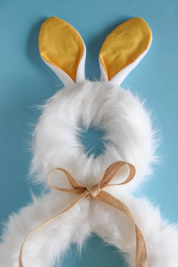 ribbon and bunny ears headband on an Easter wreath