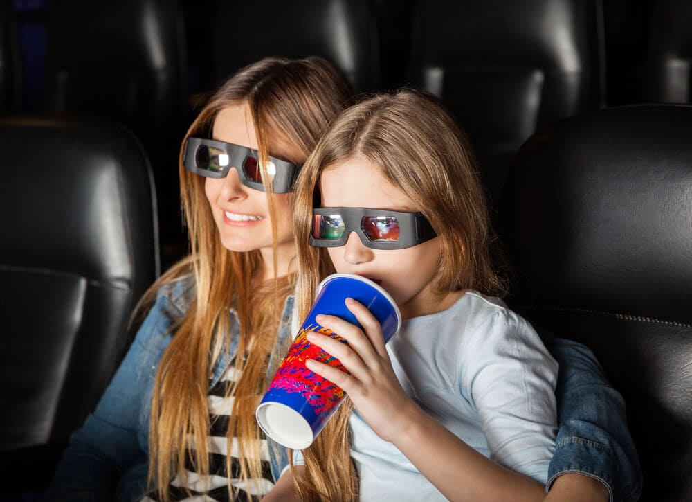 mother and daughter on a movie date