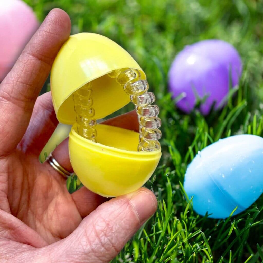 hair band in a plastic Easter egg
