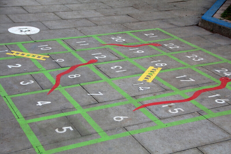 board game drawn outside with sidewalk chalk