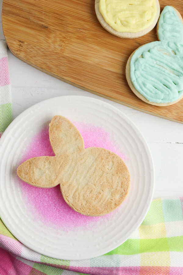 adding sugar to a Peeps bunny cookie