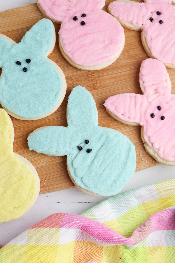 Peeps Easter bunny sugar cookies on a cutting board