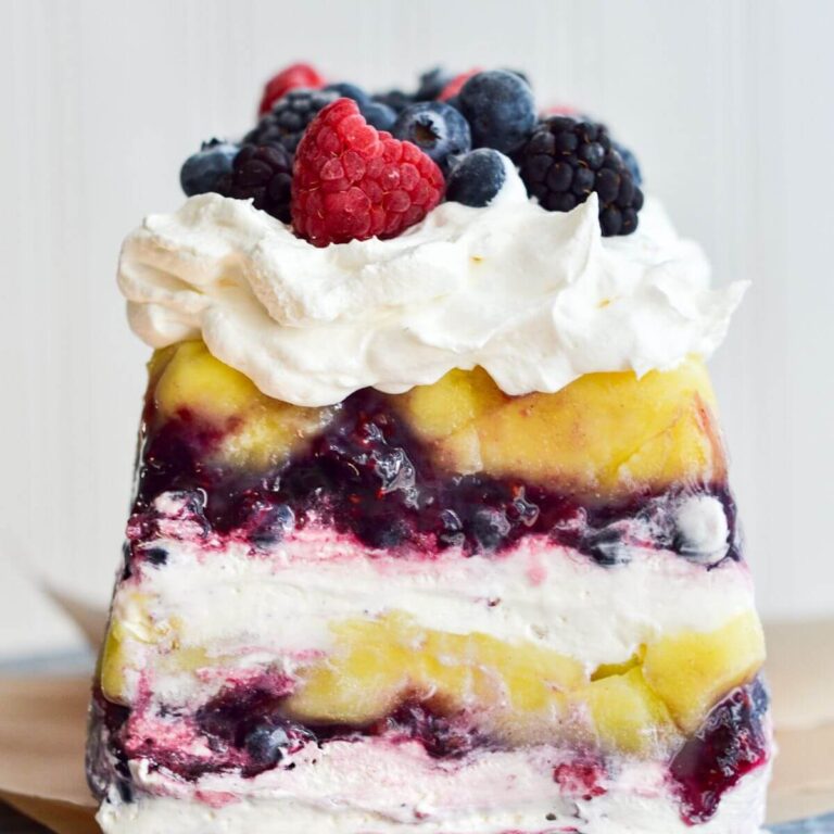 lemon berry icebox cake sliced on a plate
