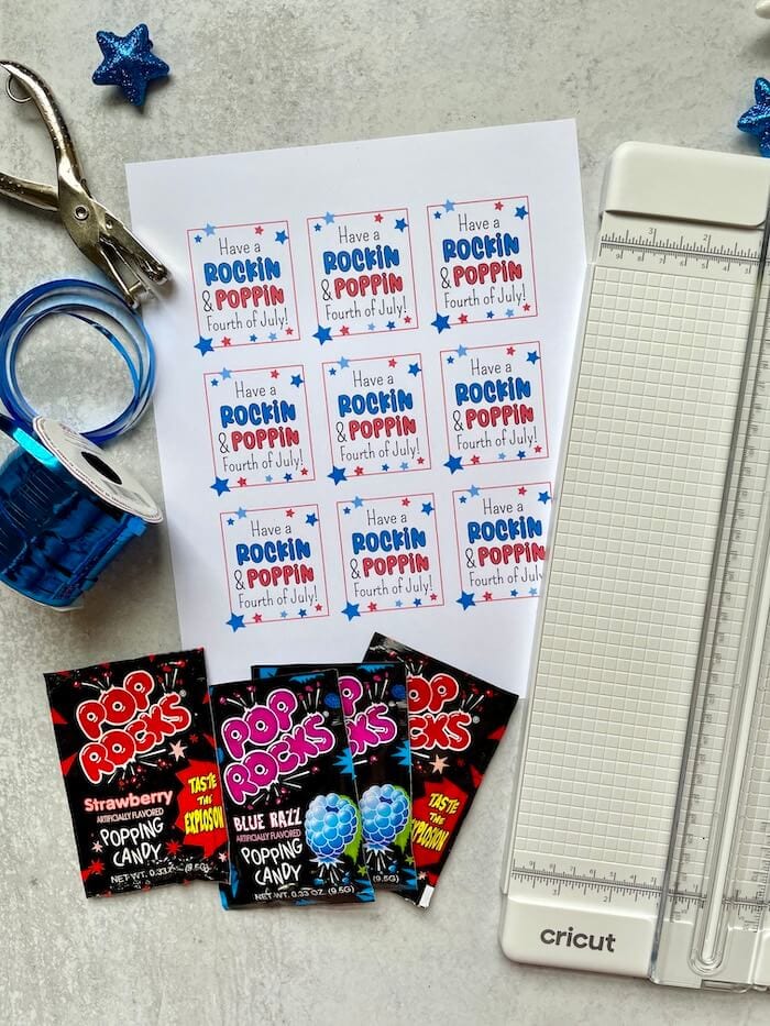July 4th favor tags, pop rocks, ribbon, and paper trimmer