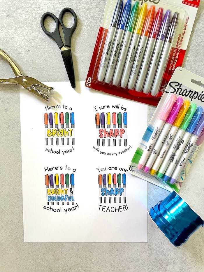 free printable Sharpie marker gift tags, sharpie markers, scissors, hole punch, and ribbon