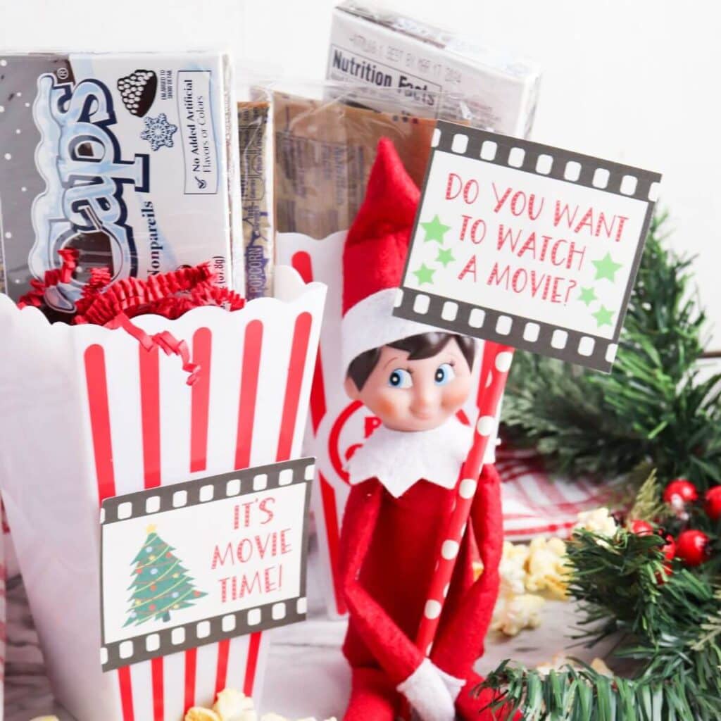 elf on the shelf movie night display with free printable signs