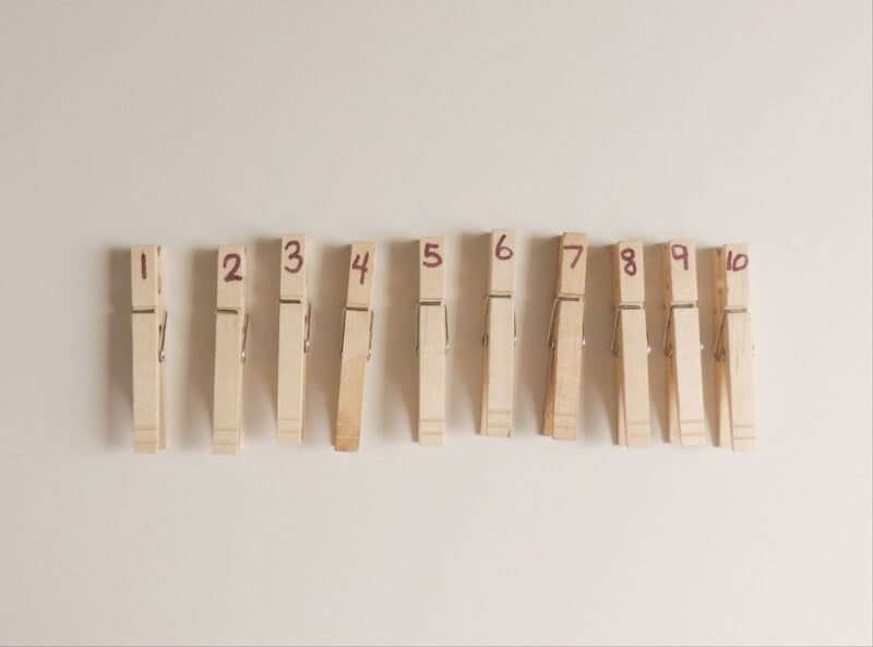 clothespins with numbers written on them