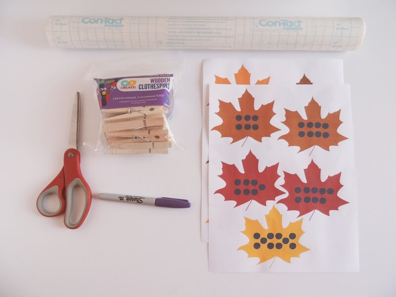 leaf number matching printable, scissors, clothespins, and marker