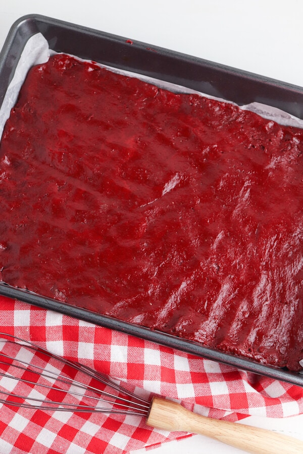 red velvet bars dough in a baking sheet