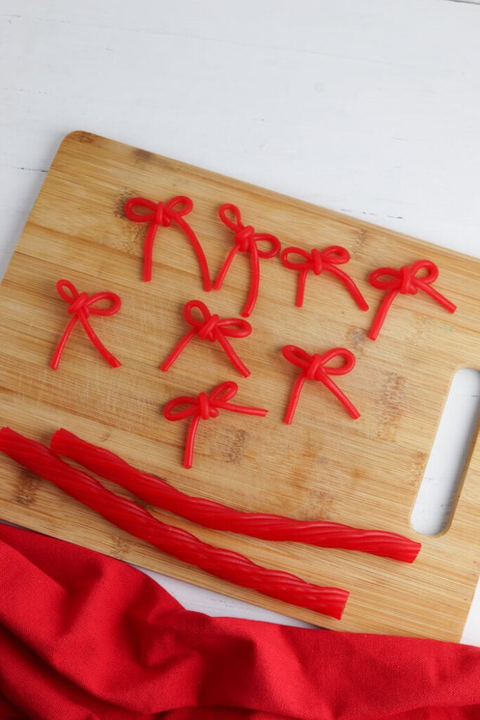 red bows made out of peel apart licorice