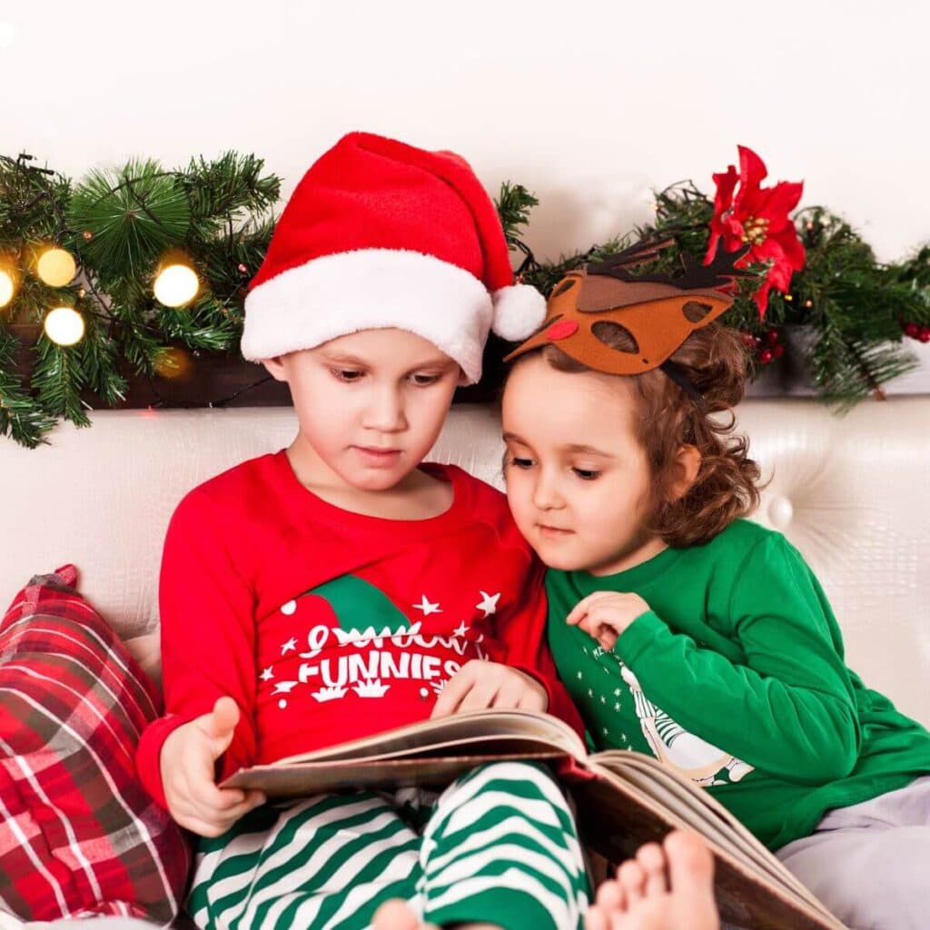 preschool kids reading Christmas book