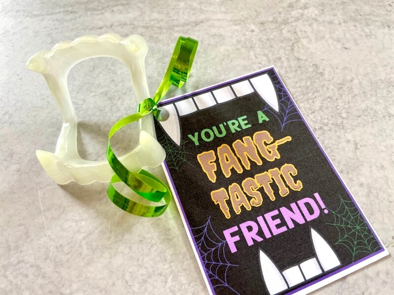 Halloween vampire fangs and a printable gift tag that says you're a fang tastic friend