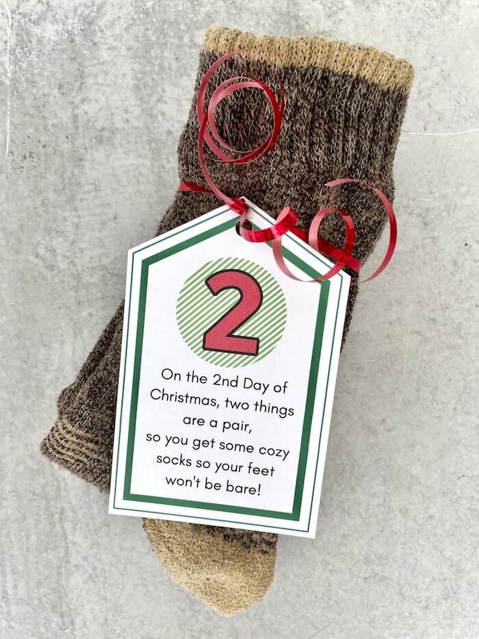 printable 12 days of christmas gift tag on a pack of socks for man