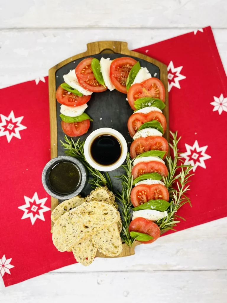 caprese salad arranged in a candy cane shape