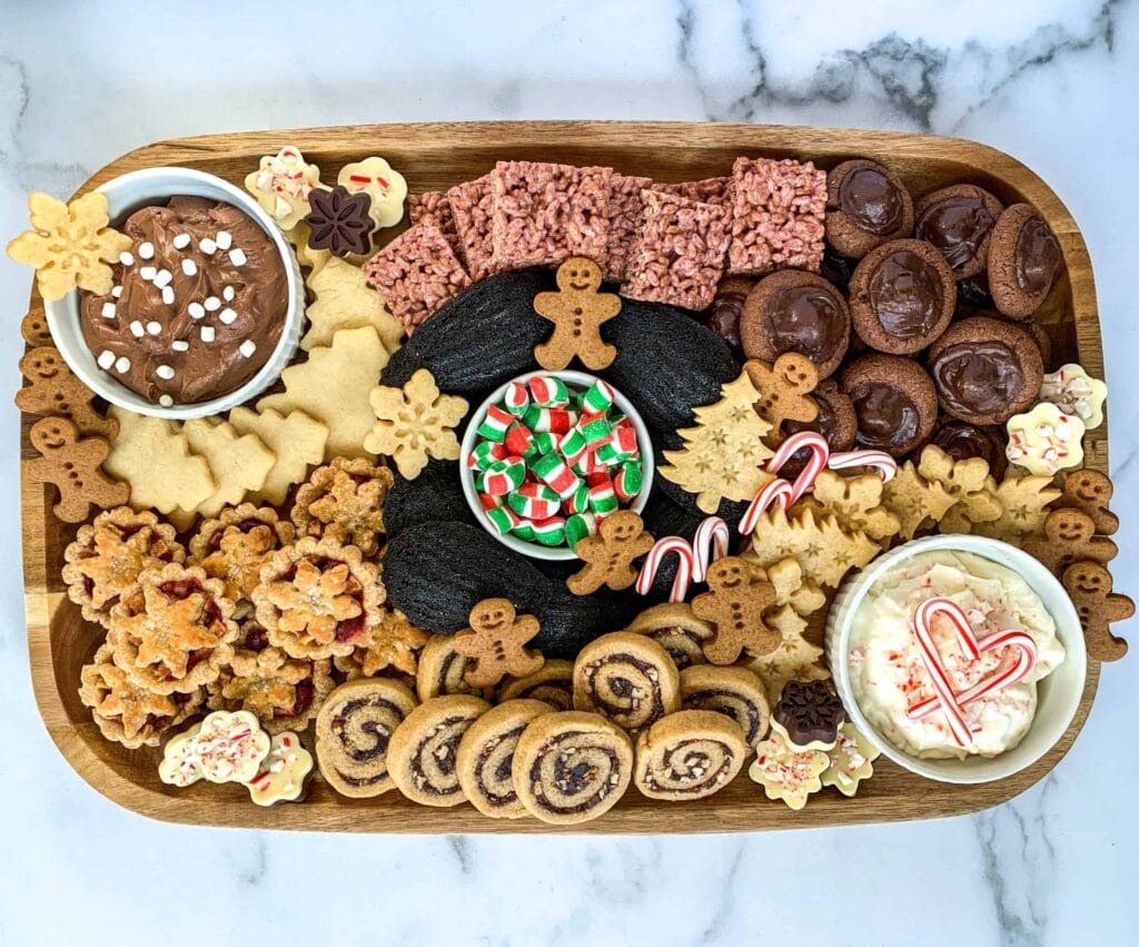 Christmas cookies displayed on a cutting board
