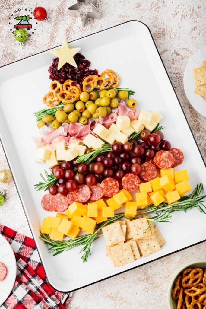 Christmas tree charcuterie board on a white platter