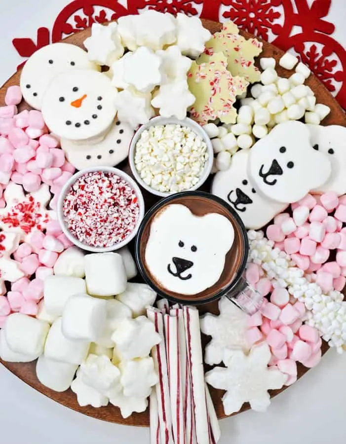 hot cocoa display board with marshmallows and cocoa toppings