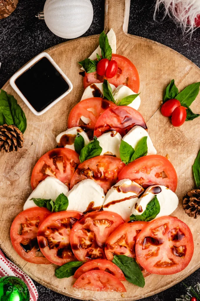 tomatoes and mozzarella shaped into a Christmas tree