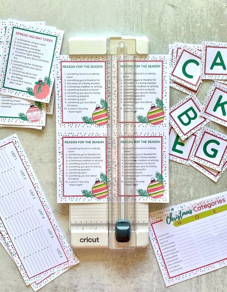 cutting the printable Christmas scattergories game PDF into cards
