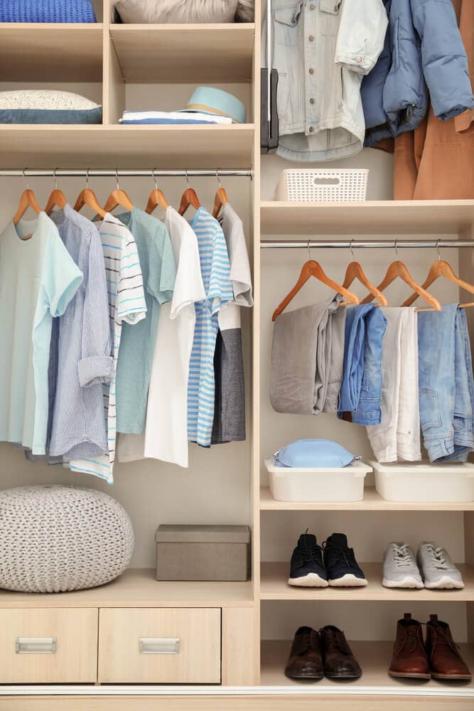 clean and clutter free closet of clothes