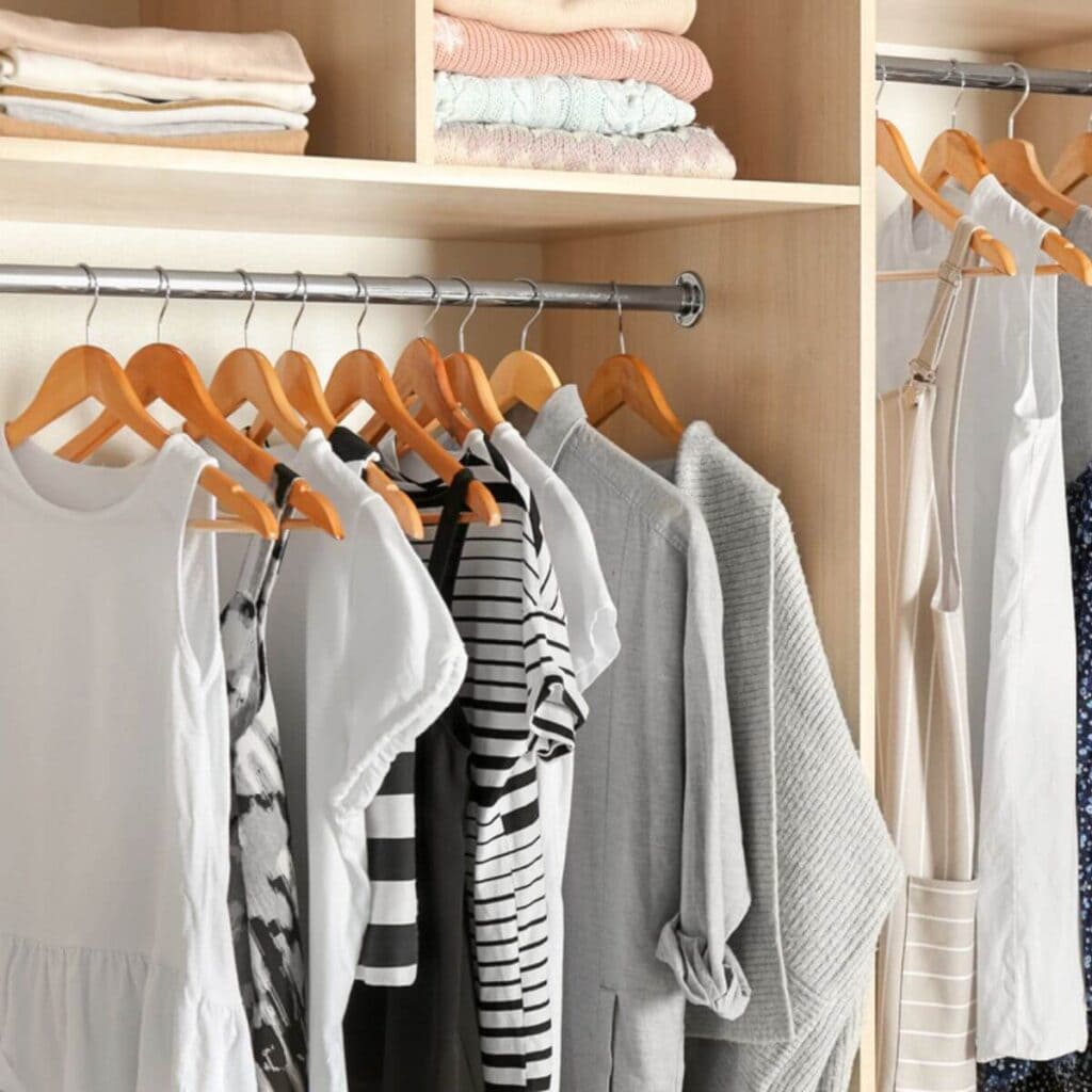 clothes hanging in a decluttered closet