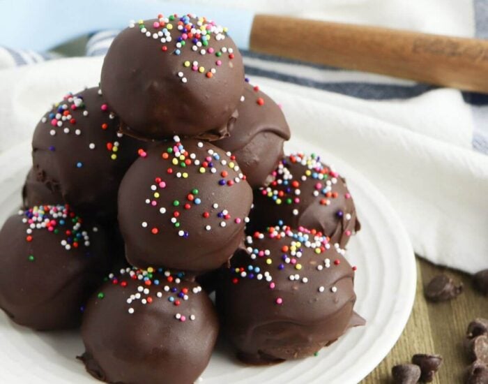brownie truffles stacked up on a plate