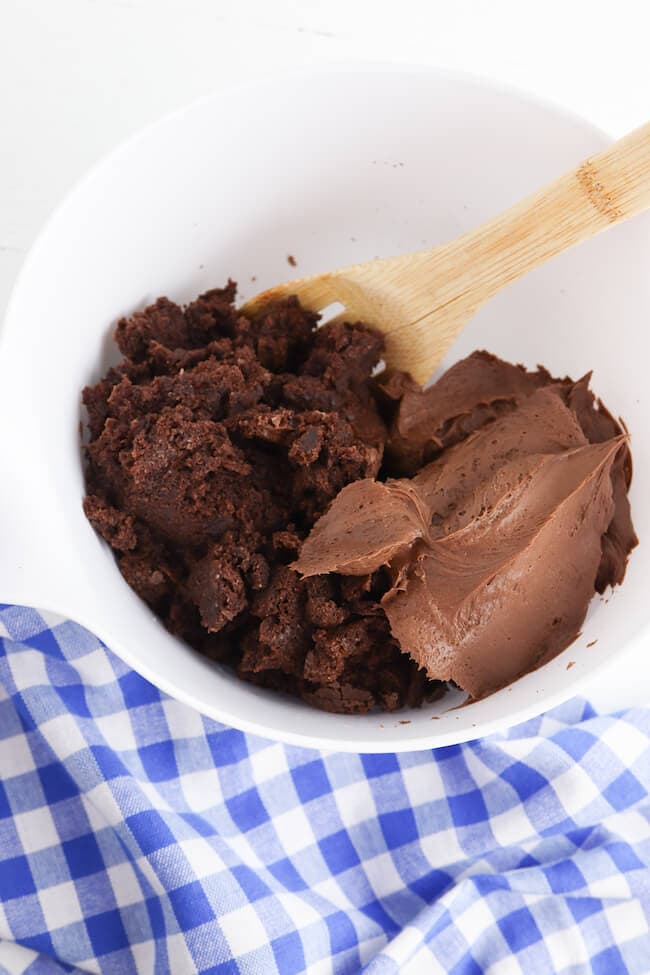 crushed up brownies and frosting in a bowl