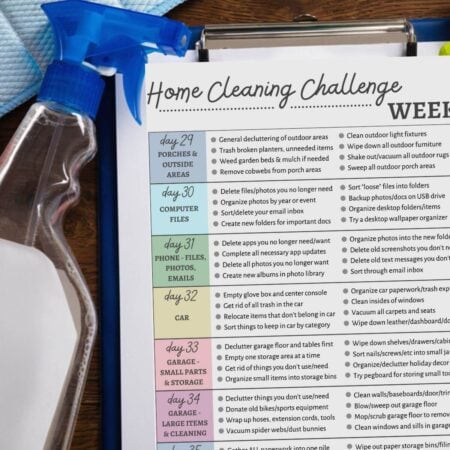 printable home cleaning challenge on a clipboard