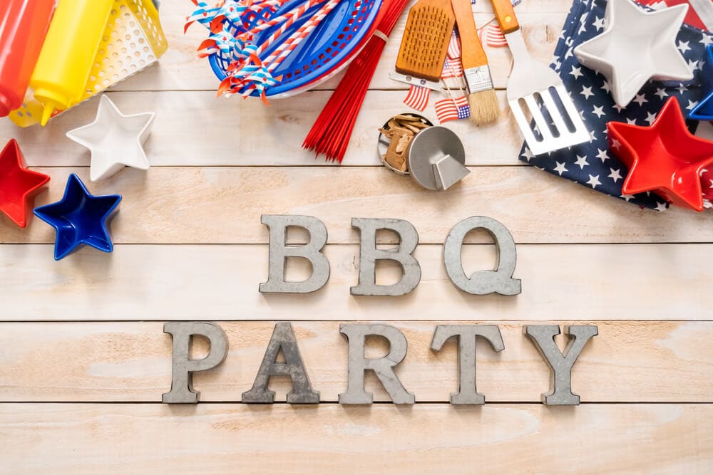 bbq party spelled out in silver letters with July 4th decorations