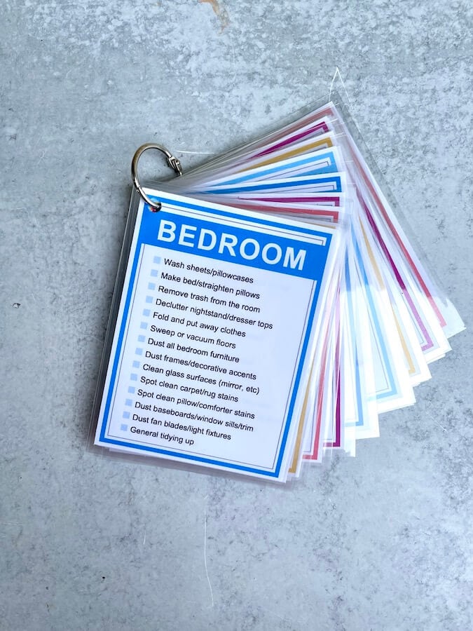 bedroom cleaning checklist cards laminated on a binder ring